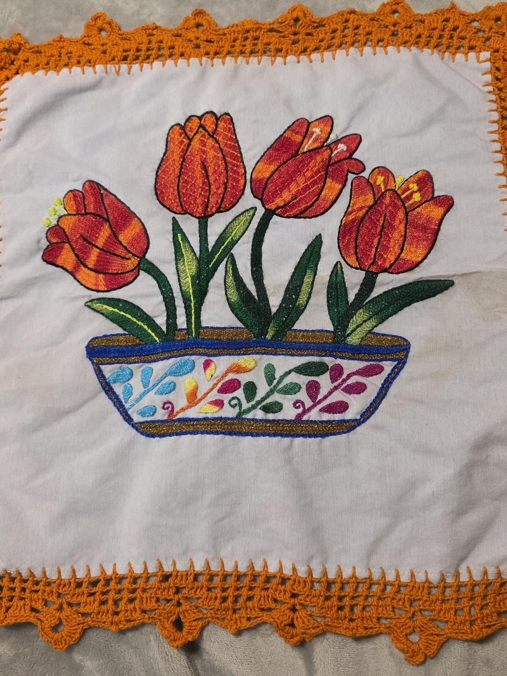 Hand-Embroidered Tulip Centerpiece with Orange Crochet Edge